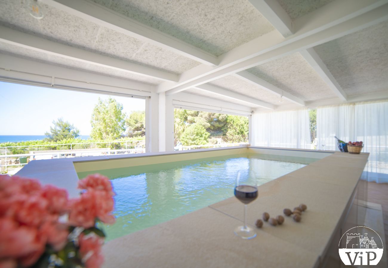 Ferienwohnung in Lido Marini - Haus privater Pool und Meerblick Klima WiFi m620