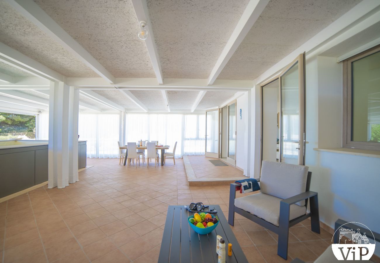 Appartement à Lido Marini - Maison piscine privée et vue mer climat WiFi m620