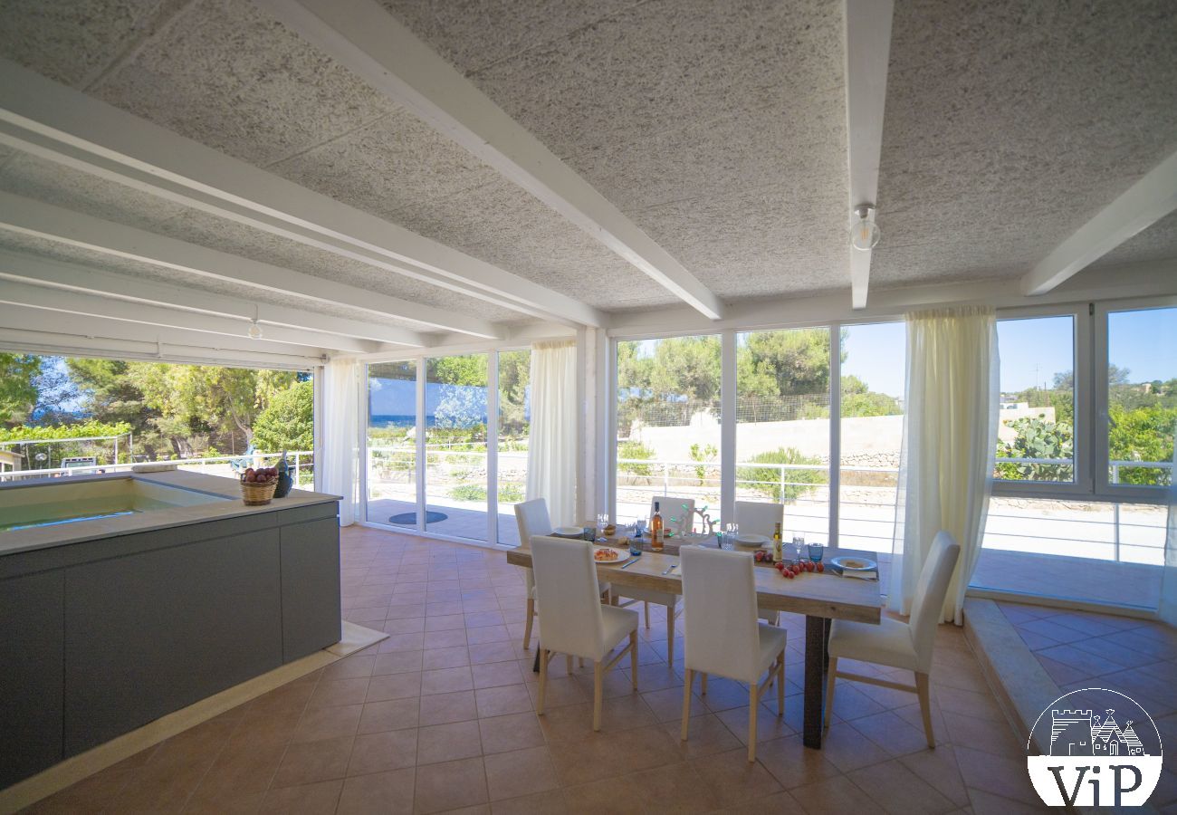 Appartement à Lido Marini - Maison piscine privée et vue mer climat WiFi m620