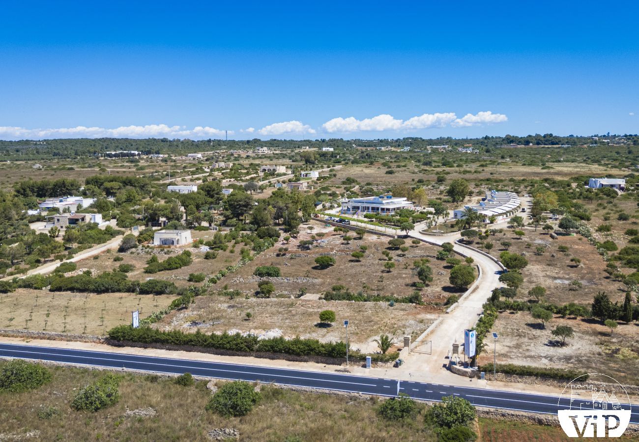 Appartement à Lido Marini - Maison piscine privée et vue mer climat WiFi m620